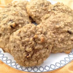 A plate of eight Breakfast Cookies on a yellow cloth