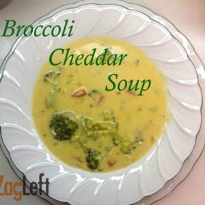 Overhead view of a bowl of broccoli cheddar soup
