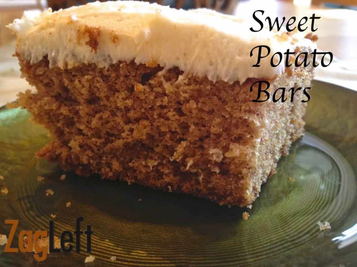 Sweet Potato Bars from Zagleft - 1a A square slice of a sweet potato bar topped with white icing on a small plate