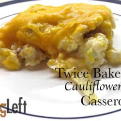 Twice Baked Cauliflower topped with a layer of melted cheese on a plate