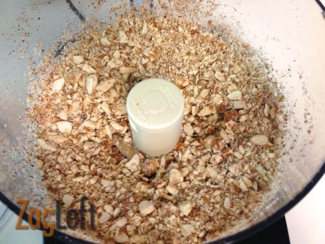Chunks of almonds in a food processor