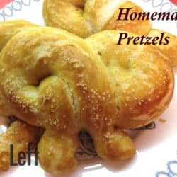Three Homemade Pretzels topped with salt on a plate