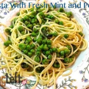 An overhead view of a bowl of Fresh Mint and Peas on a bed of pasta