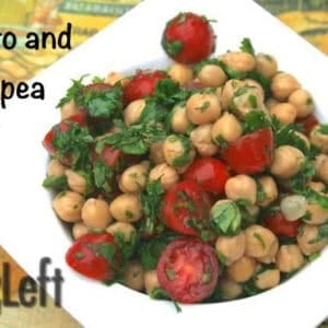 Tomato and Chickpea Salad topped with cilantro in a square bowl