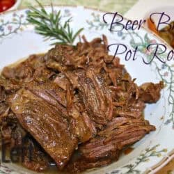 Beer Braised Pot Roast on a plate garnished with a sprig of rosemary
