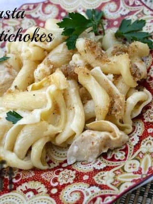 Baked Pasta with Artichokes and Brie topped with breadcrumbs on a plate