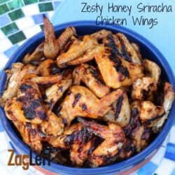 Overhead view of a large serving dish of Zesty Honey Sriracha Grilled Chicken Wings