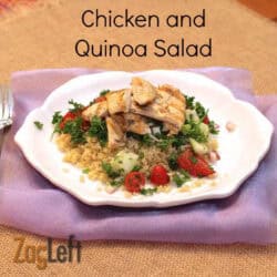 A plate of Chicken and Quinoa Salad with chopped cucumbers and cherry tomatoes