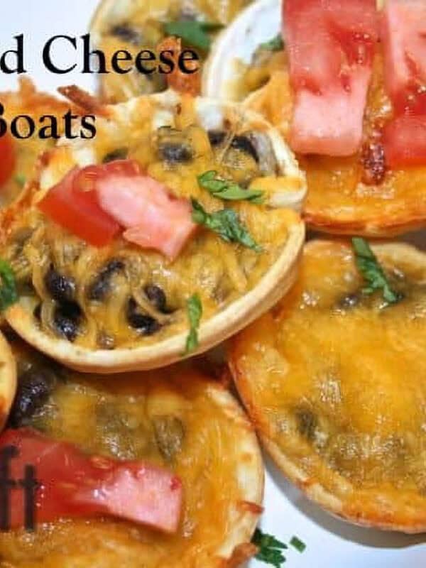Closeup of multiple Bean and Cheese Nacho Boats