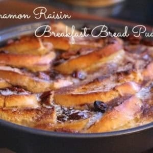 Cinnamon Raisin Breakfast Bread Pudding in a large circular baking dish.