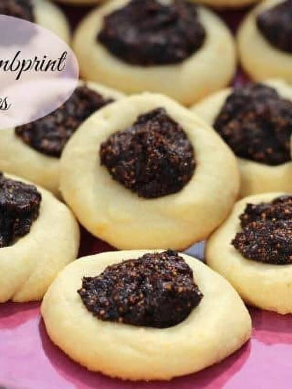 A plate of Fig Thumbprint Cookies on a large plate