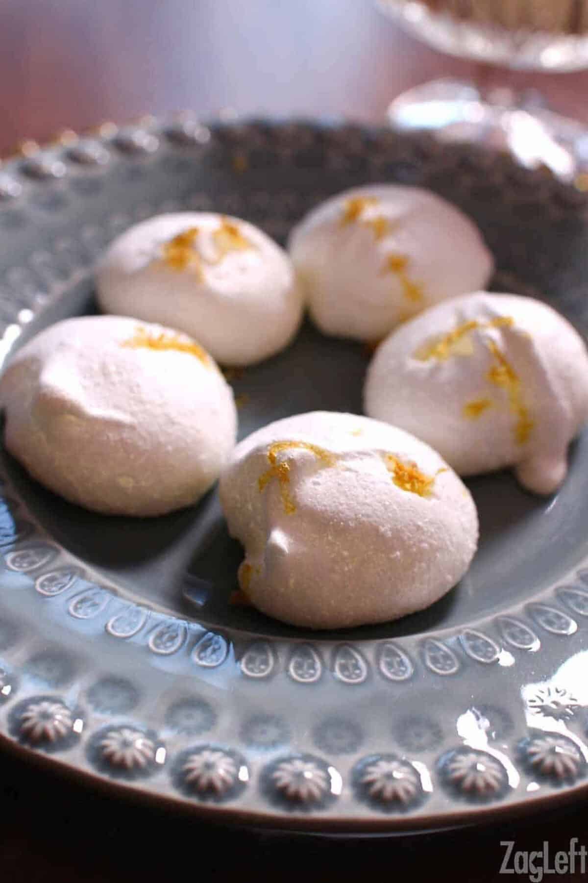 A large plate of five Lemon Drop Meringues 