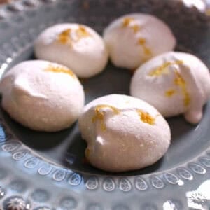 A large plate of five Lemon Drop Meringues